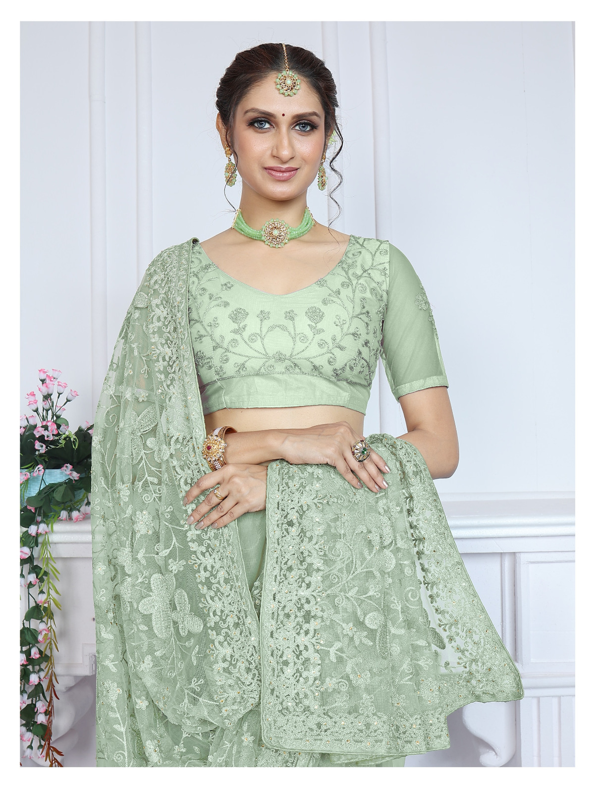 Mint Green Heavy Butterfly Net Chikankari Saree with Aari Embroidery & Stone Work