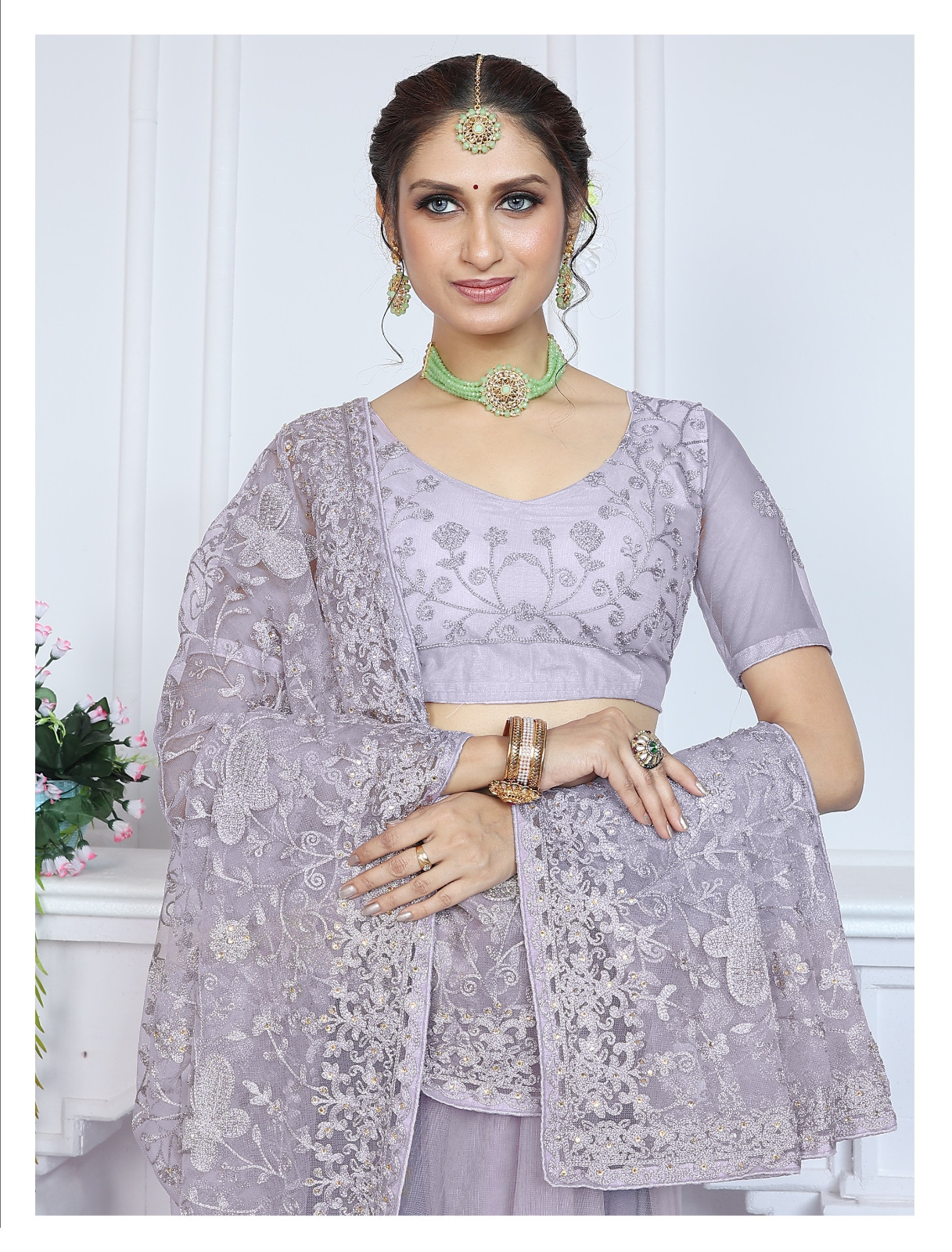 Light Purple Heavy Butterfly Net Chikankari Saree with Aari Embroidery & Stone Work